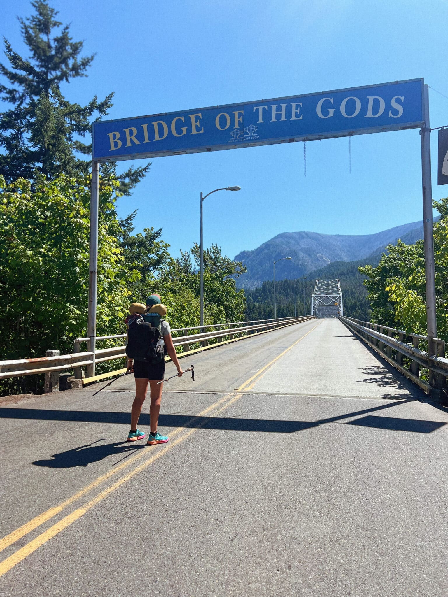PCT Hiker at the beginning of the Bridge of the Gods in Cascade Locks, OR.
