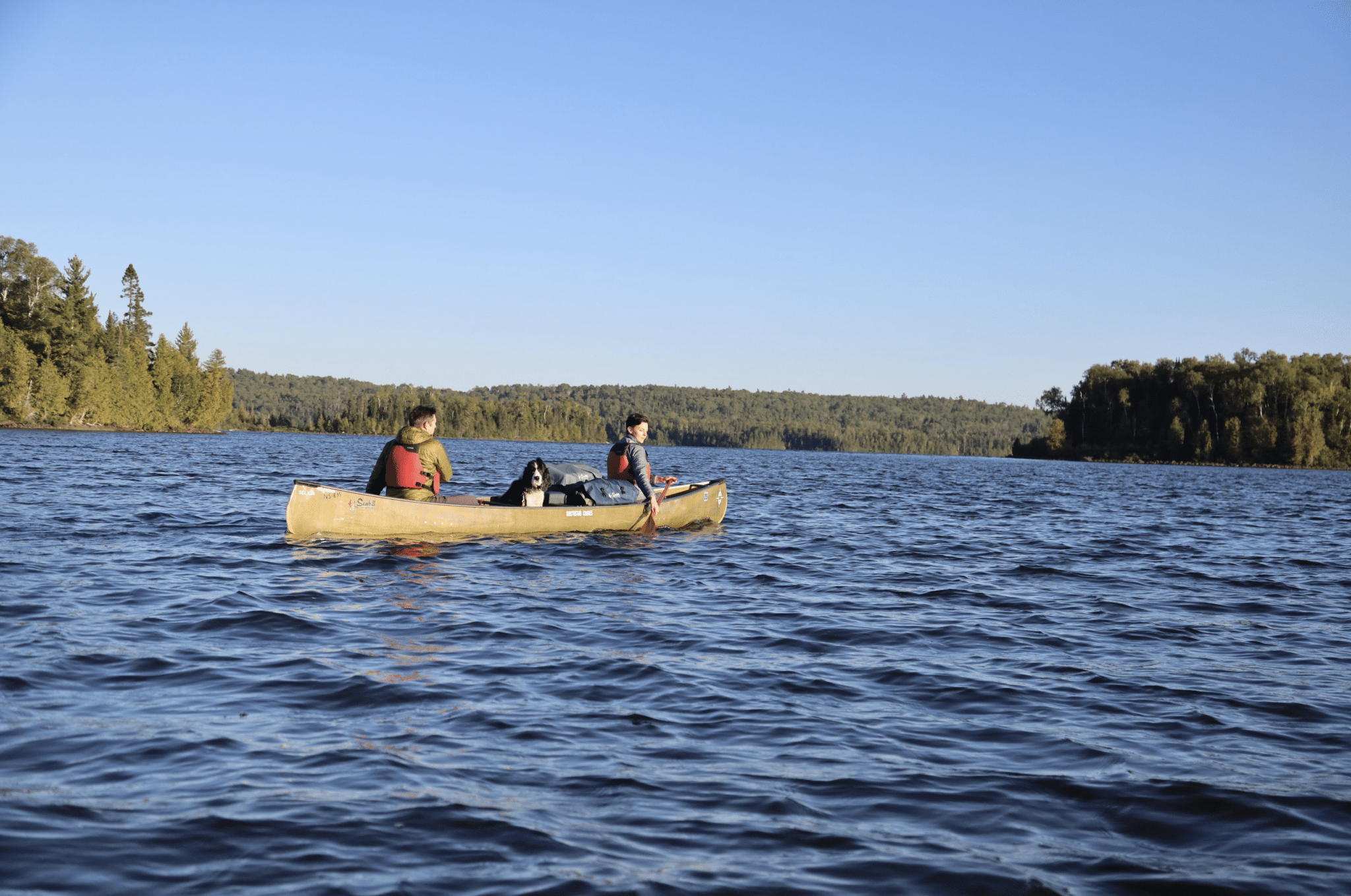 Paddlers traverse a lake in the Boundary Waters.